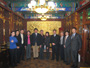 Paul Zane Pilzer with Li Daning (Director of the Administration of Traditional Chinese Medicine) and Meijun (Vice President of Tangrentong), among others (December 2009)